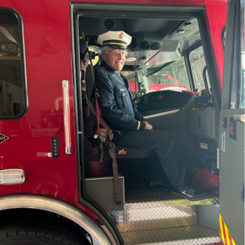 Borron Sits in Fire Truck Prepared for his Ride Along